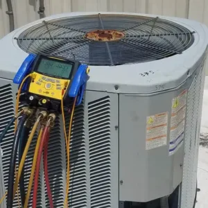 Rooftop AC unit being services by Castle Air Conditioning & Heating in Southwest Houston.