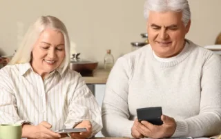 houston-couple-saving-on-energy-bills-from-heating-system-improvements | Castle AC & Heating Image of a couple talking about upgrading their heating system