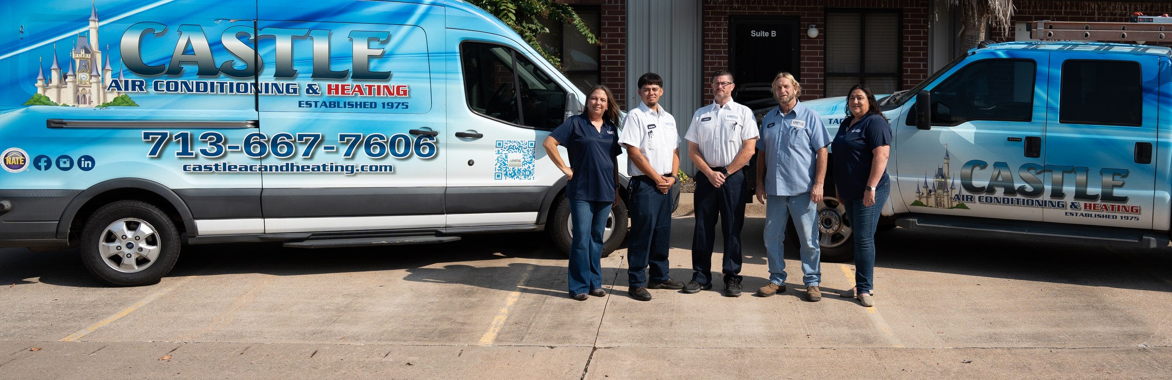 The Castle Air Conditioning and Heating team with the company van and service truck outside the Fulshear, Texas shop